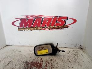 Gebruikte Buitenspiegel links Toyota Corolla (EB/WZ/CD) 1.4 16V VVT-i Prijs € 25,00 Margeregeling aangeboden door Autosloopbedrijf gebr. Maris