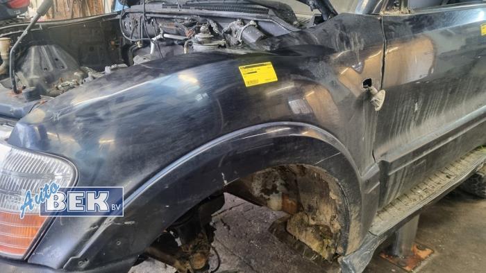 Framskärm, vänster från en Mitsubishi Pajero Hardtop (V8/9) 3.2 DI-D 16V 2006