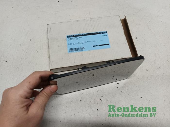Spiegelglas links van een Volkswagen Golf III (1H1) 1.6 CL 1996