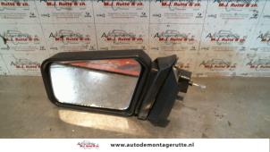 O84738 Gebruikte buitenspiegel links Lada Samara