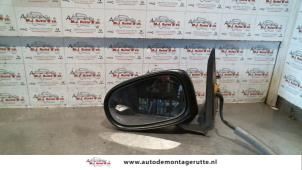 O84925 Gebruikte buitenspiegel links Nissan Almera Tino