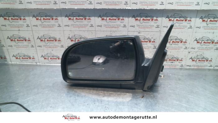 Gebruikte Buitenspiegel links Kia Carens O85018