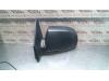 Gebruikte Buitenspiegel links Kia Carens O85018