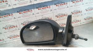 O84897 Gebruikte buitenspiegel links Hyundai Accent