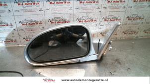 O84885 Gebruikte spiegel buiten links Hyundai Coupe