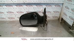 O85573 Gebruikte spiegel buiten links Daihatsu Cuore