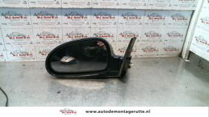 O84887 Gebruikte spiegel buiten links Hyundai Coupe