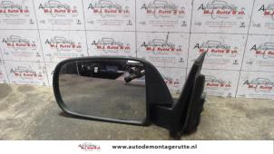 O85569 Gebruikte buitenspiegel links Daihatsu Cuore