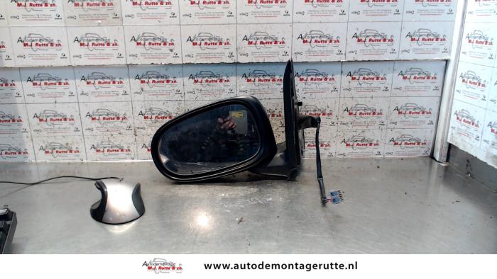 Gebruikte Buitenspiegel links Nissan Almera Tino O84922
