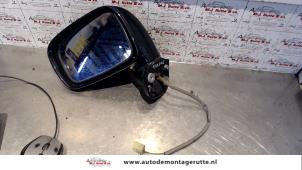 O85712 Gebruikte spiegel buiten links Suzuki Liana