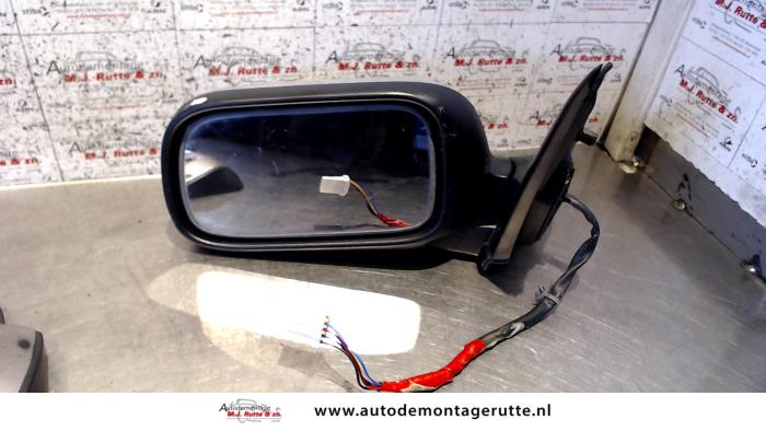 Gebruikte Buitenspiegel links Nissan Primera O84915