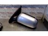 Gebruikte Buitenspiegel links Nissan Primera O84915