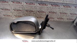 O85447 Gebruikte buitenspiegel links Mitsubishi Space Star