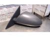 Gebruikte Buitenspiegel links Nissan Primera O84921