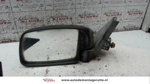 O85292 Gebruikte buitenspiegel links Renault R5