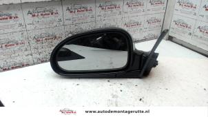 O84886 Gebruikte spiegel buiten links Hyundai Coupe