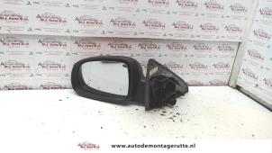 O84367 Gebruikte spiegel buiten links Opel Tigra