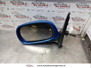 O140340 Gebruikte spiegel buiten links Nissan Micra