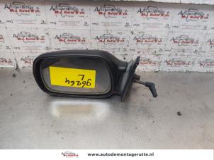 O148091 Gebruikte buitenspiegel links Toyota Starlet