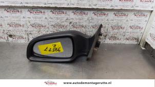 O159409 Gebruikte buitenspiegel links Opel Astra