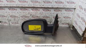 O159462 Gebruikte spiegel buiten links Opel Corsa