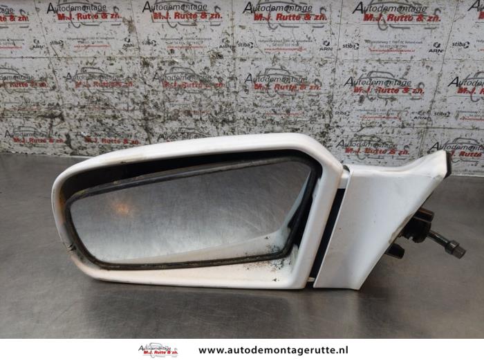 Gebruikte Buitenspiegel links Mazda 323F O169974