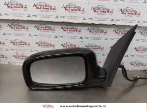 O174253 Gebruikte spiegel buiten links Daihatsu Sirion