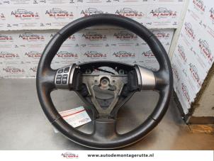 Begagnade Ratt Suzuki Splash 1.3 DDiS 16V Pris € 40,00 Marginaltabell erbjuds av Autodemontage M.J. Rutte B.V.