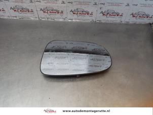 Begagnade Spegelglas, vänster Ford Galaxy (WGR) 2.3i 16V Pris på förfrågan erbjuds av Autodemontage M.J. Rutte B.V.