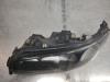 Gebruikte Koplamp links Volvo V70 O195259