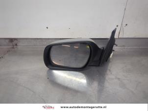 O195328 Gebruikte spiegel buiten links Mazda 3.