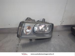 O195457 Gebruikte koplamp links Citroen Jumpy
