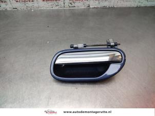 O195489 Gebruikte portiergreep 4deurs links-achter Volvo S40