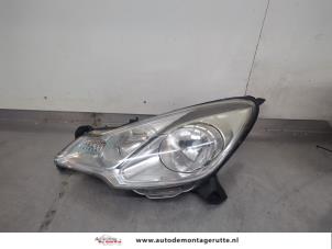 O195609 Gebruikte koplamp links Citroen DS3