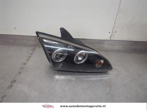 O195615 Gebruikte rechter koplamp Ford Focus
