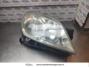 O195828 Gebruikte koplamp rechts Opel Astra