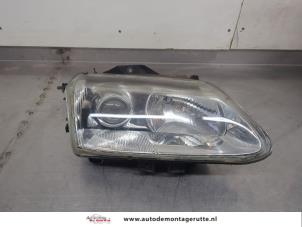 O195884 Gebruikte koplamp rechts Renault Espace