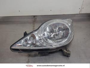 O195914 Gebruikte koplamp links Peugeot 107