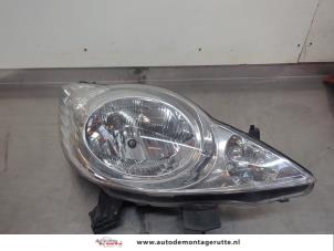 O195915 Gebruikte koplamp rechts Peugeot 107
