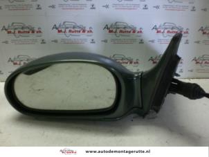 O85039 Gebruikte spiegel buiten links Kia Rio