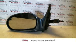 O85042 Gebruikte spiegel buiten links Kia Rio