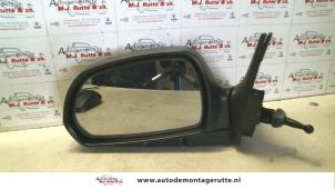 O84899 Gebruikte buitenspiegel links Hyundai Elantra