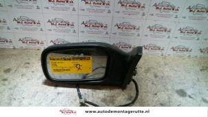 O84910 Gebruikte buitenspiegel links Nissan Primera