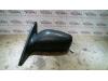 Gebruikte Buitenspiegel links Nissan Primera O84910