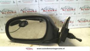 O84854 Gebruikte spiegel buiten links Hyundai Excel