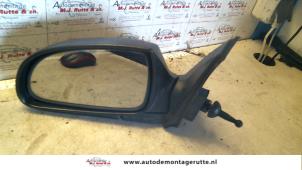 O84894 Gebruikte buitenspiegel links Hyundai Accent