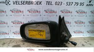 O84766 Gebruikte buitenspiegel links Mazda 626