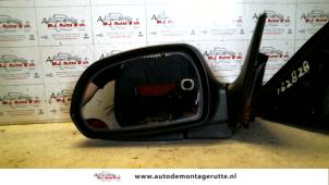 O85030 Gebruikte buitenspiegel links Kia Shuma
