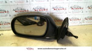 O84856 Gebruikte spiegel buiten links Hyundai Excel