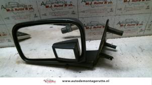 O84569 Gebruikte spiegel buiten links Volkswagen Golf